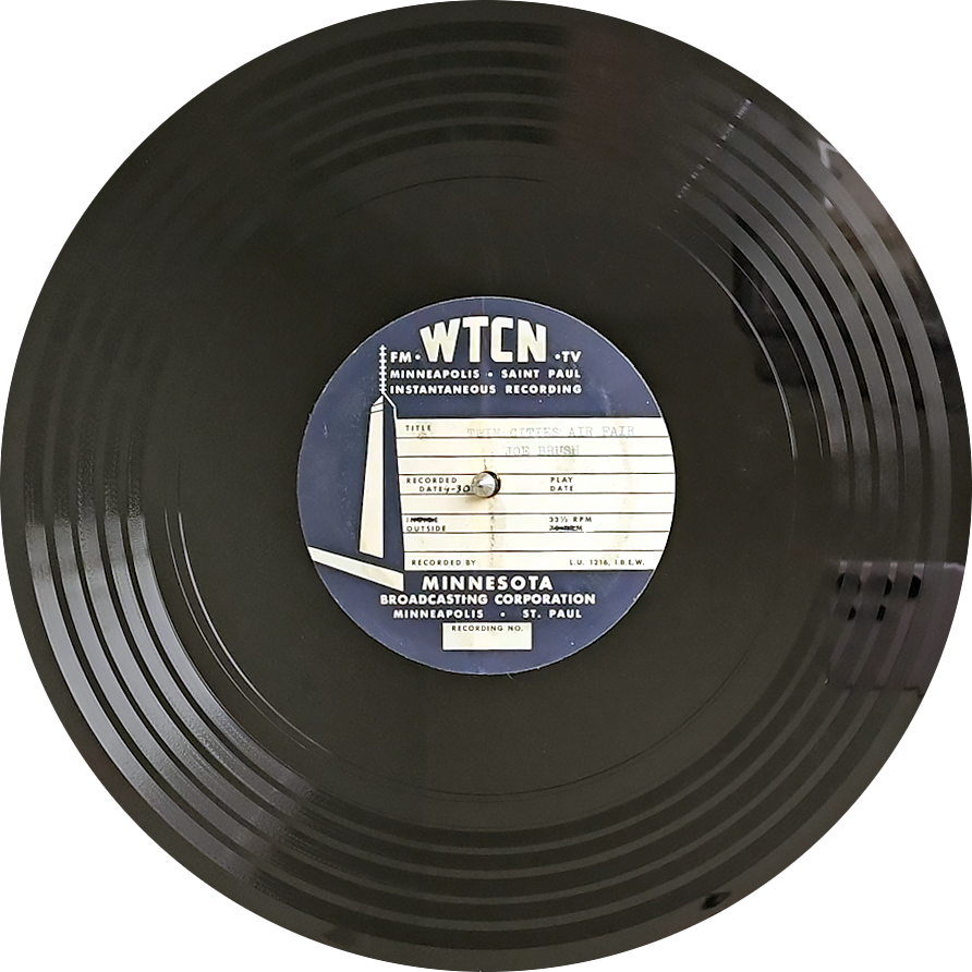 A record with five tracks and the label for Minnesota Broadcasting Corporation. The title "Twin Cities Air Fair" appears typed onto the label and below that "Joe Brush".