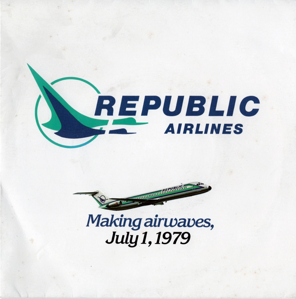 This image is of a record sleeve that appears to be somewhat aged, with slight creases and signs of wear. The upper half features the logo of Republic Airlines, which consists of an abstract design with a blue and teal color scheme, resembling a stylized bird or a plane in motion. Below the logo, the text "REPUBLIC AIRLINES" is written in bold, dark blue block letters. Underneath, an illustration of an airplane mid-flight is depicted, featuring a green and white color scheme with the word "REPUBLIC" written on its fuselage. At the bottom of the sleeve, in blue serif font, it reads "Making airwaves, July 1, 1979." The background of the sleeve is white.