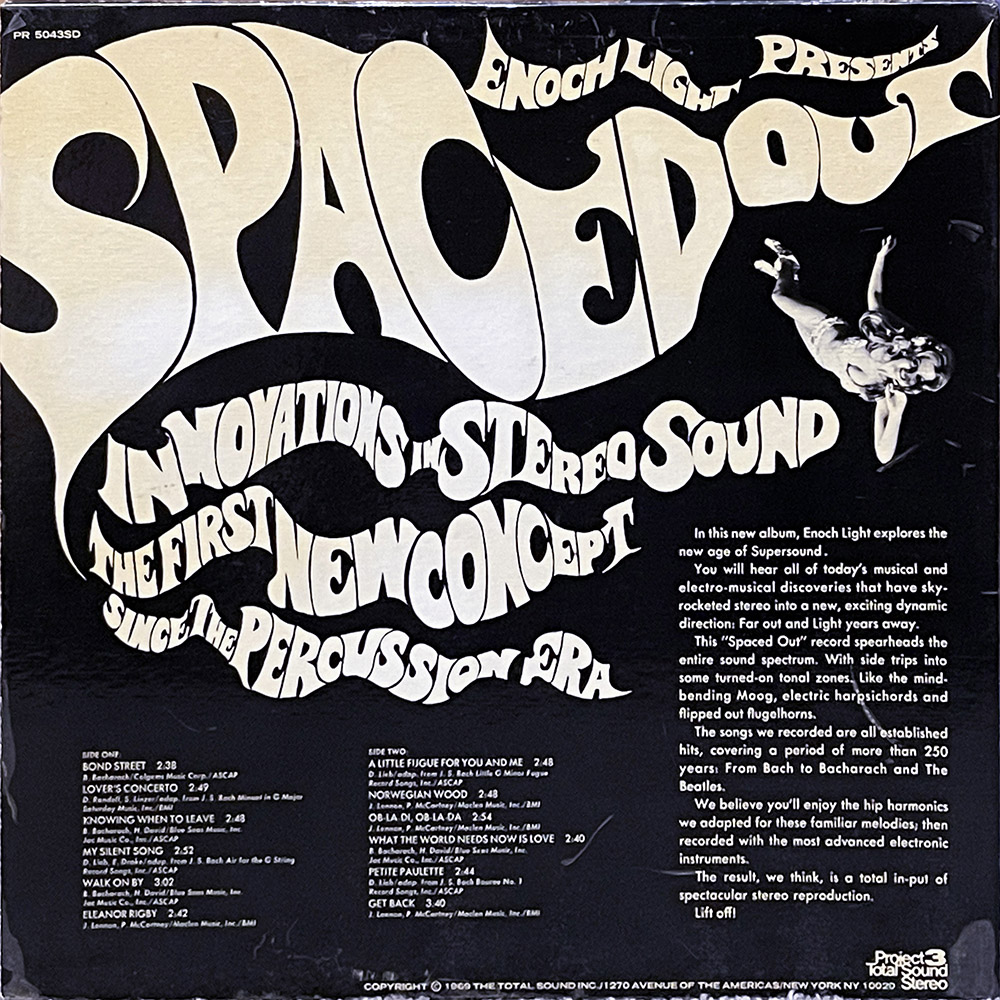 This image is the back cover of the album "Spaced Out" by Enoch Light. The background is black, enhancing the focus on the central design elements. Dominating the top half of the cover is the album's title "Spaced Out" in a large, white, psychedelic font, beneath which it reads "Innovations in Stereo Sound - The First New Concept Since The Percussion Era." A small image to the right depicts a woman dressed in a white and silver space-themed outfit, floating in space, echoing the front cover's theme. Below the title, a detailed description in white text highlights the album's features, noting it as an exploration of the new age of "Supersound" incorporating musical and electro-musical discoveries. The album cover lists tracks from side one and side two, mentioning classical and contemporary influences from Bach to Burt Bacharach, and emphasizes the use of advanced electronic instruments for a revolutionary stereo experience. The footer of the cover contains copyright information and the label's logo, "Project 3 Total Stereo."