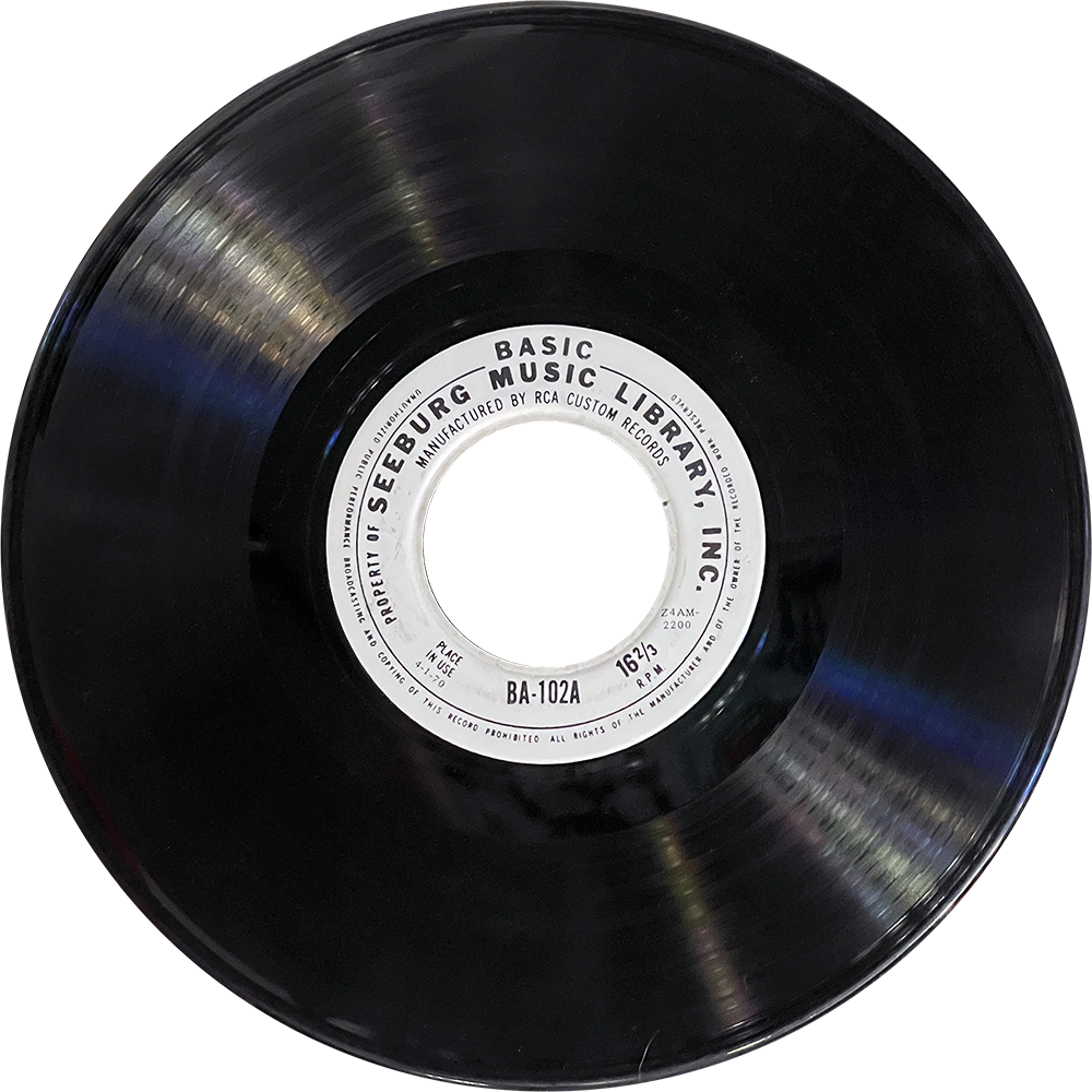 A Seeburg Basic Music Library vinyl record, side A (BA-102A), with a large 2-inch center hole and label indicating 16⅔ RPM playback, manufactured by RCA Custom Records.