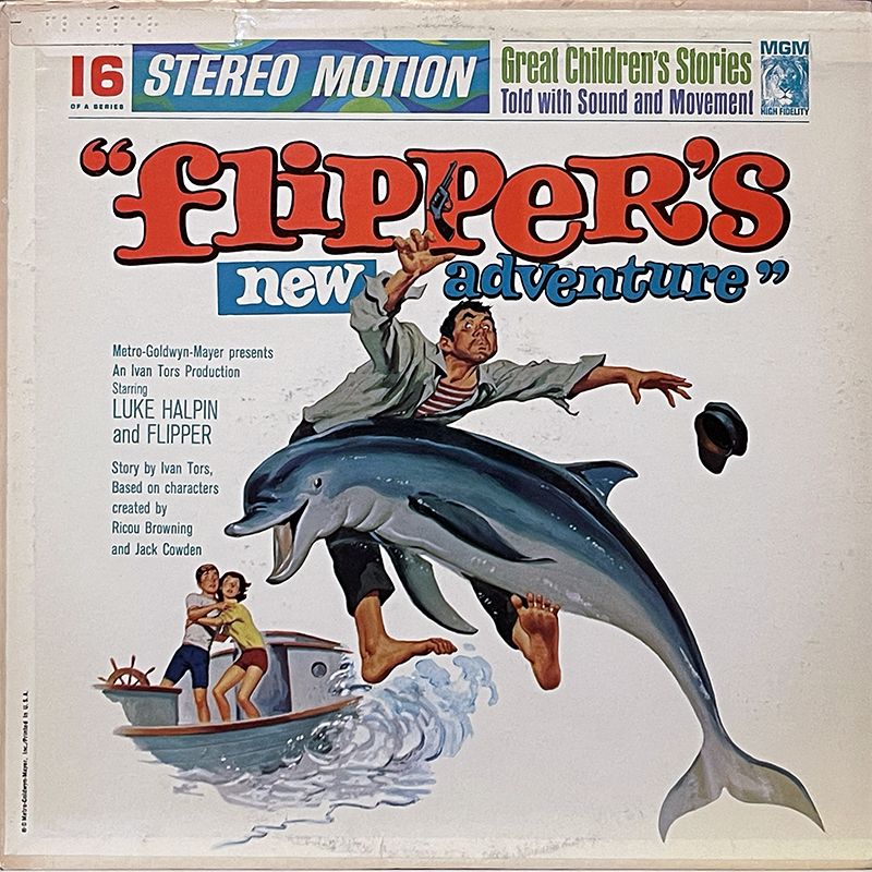 Cover of the 1964 MGM Records children’s LP Flipper’s New Adventure (catalog number CHS-516) from the Great Children’s Stories in Stereo Motion series. The illustrated artwork shows Flipper the dolphin leaping out of the ocean, tossing a man into the air while his hat flies off. In the background, a young boy and girl cling to each other on a small boat, watching the scene. The title is printed in bold red and blue letters across the top.